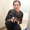 zoie keast professional dog trainer with puppies